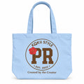 KOKii Style PR tote bag in Sky Blue with brown PR badge and red hibiscus