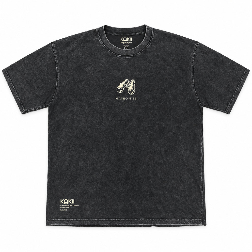 Mateo 6:33 black mineral wash faith tee by Kokii Style – front with small binoculars graphic and Mateo 6:33 chest print