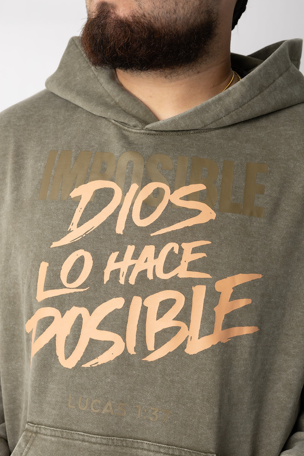 Close-up of the olive Dios Lo Hace Posible faith hoodie front print with Lucas 1:37 – Kokii Style